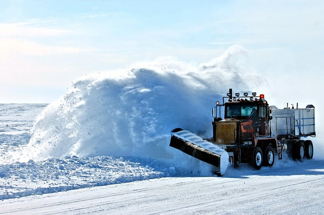 A truck removing snow after a large snow storm that hit the Crystal Lake area