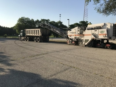 The commuter lot being milled for Metra parking in Crystal Lake